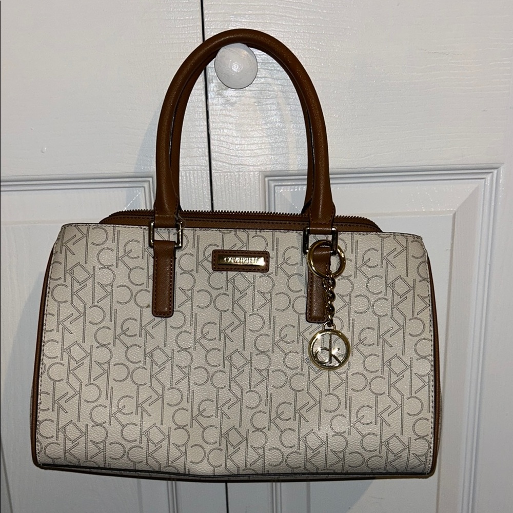 White and Tan Calvin Klein bag